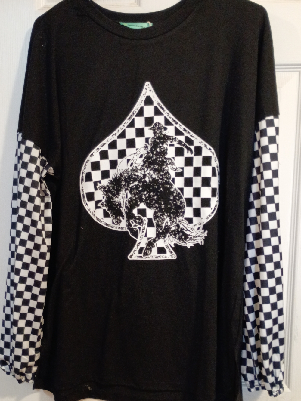 Black Long-Sleeve Graphic Tee with Checkerboard Sleeve Detail